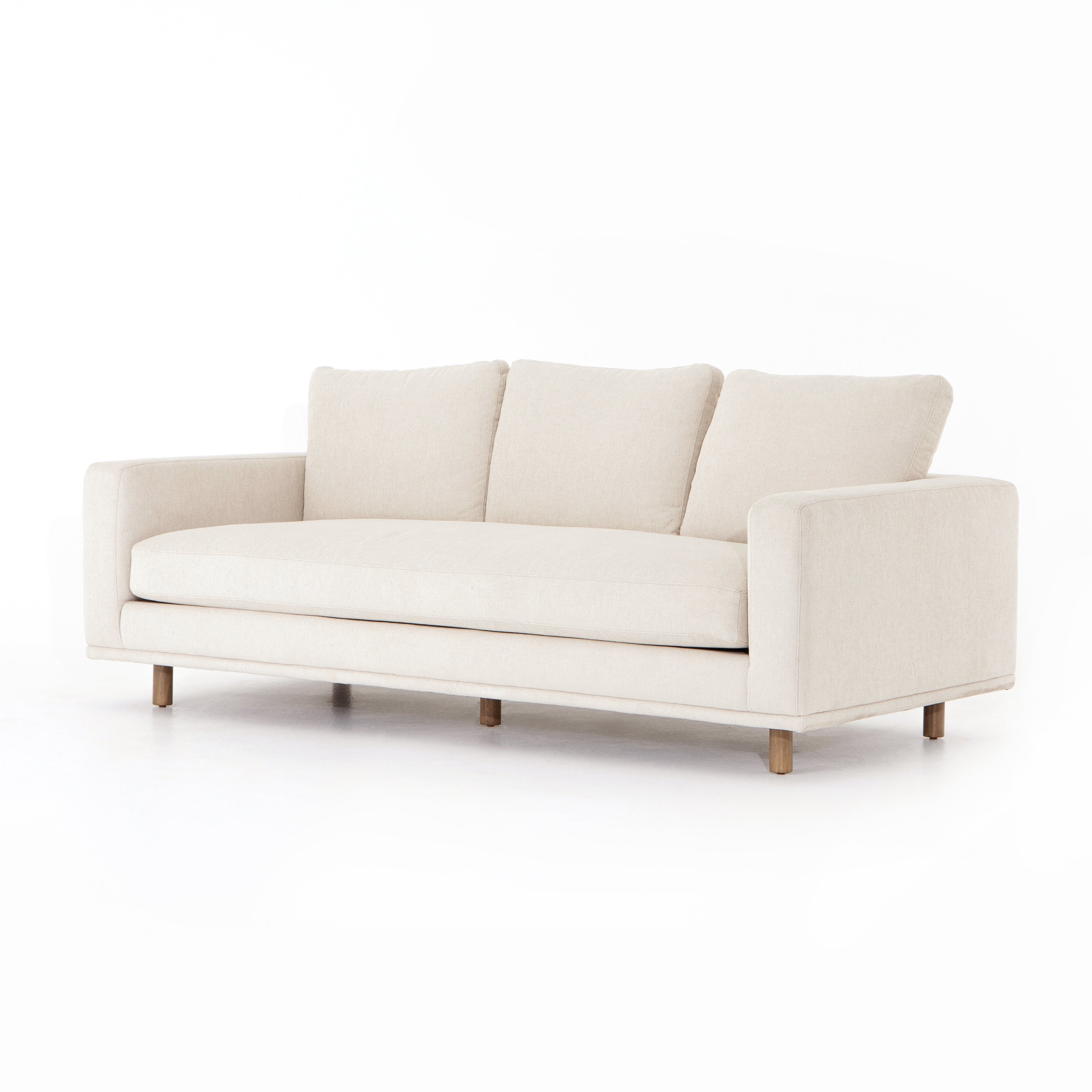 Performance-grade fabric brings surprising livability to a show-stopping silhouette. Pristinely tailored ivory upholstery exudes elegance, with clean track arms and loose feather-blend cushioning for total comfort. Cushions not reversible. Amethyst Home provides interior design, new construction, custom furniture, and area rugs in the Des Moines metro area.