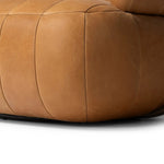 Featuring Doss Terra Brown Oak Accent Swivel Chair by Four Hands at Amethyst Home. The ultimate in polished media style seating has arrived. Framed in oak, this 360-degree swivel chair is constructed with two separate pieces â€” the seat and the back. The piece features evenly spaced spring suspension and caramel top-grain leather stitched into 5.5-inch channe. Amethyst Home provides interior design, new home construction design consulting, vintage area rugs, and lighting in the Austin metro area.