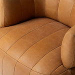 Featuring Doss Terra Brown Oak Accent Swivel Chair by Four Hands at Amethyst Home. The ultimate in polished media style seating has arrived. Framed in oak, this 360-degree swivel chair is constructed with two separate pieces â€” the seat and the back. The piece features evenly spaced spring suspension and caramel top-grain leather stitched into 5.5-inch channel. Amethyst Home provides interior design, new home construction design consulting, vintage area rugs, and lighting in the Miami metro area.