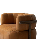 Featuring Doss Terra Brown Oak Accent Swivel Chair by Four Hands at Amethyst Home. The ultimate in polished media style seating has arrived. Framed in oak, this 360-degree swivel chair is constructed with two separate pieces â€” the seat and the back. The piece features evenly spaced spring suspension and caramel top-grain leather stitched into 5.5-inch chann. Amethyst Home provides interior design, new home construction design consulting, vintage area rugs, and lighting in the Seattle metro area.