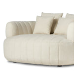Featuring Doss Terra Brown Oak Media Lounger by Four Hands at Amethyst Home. The ultimate in polished media style seating has arrived. Framed in oak, this lounger is constructed with two separate pieces â€” the seat and the back â€” and accompanied by four toss cushions. The lounger features evenly spaced spring suspension and a heavy boucle upholstery st. Amethyst Home provides interior design, new home construction design consulting, vintage area rugs, and lighting in the Los Angeles metro area.