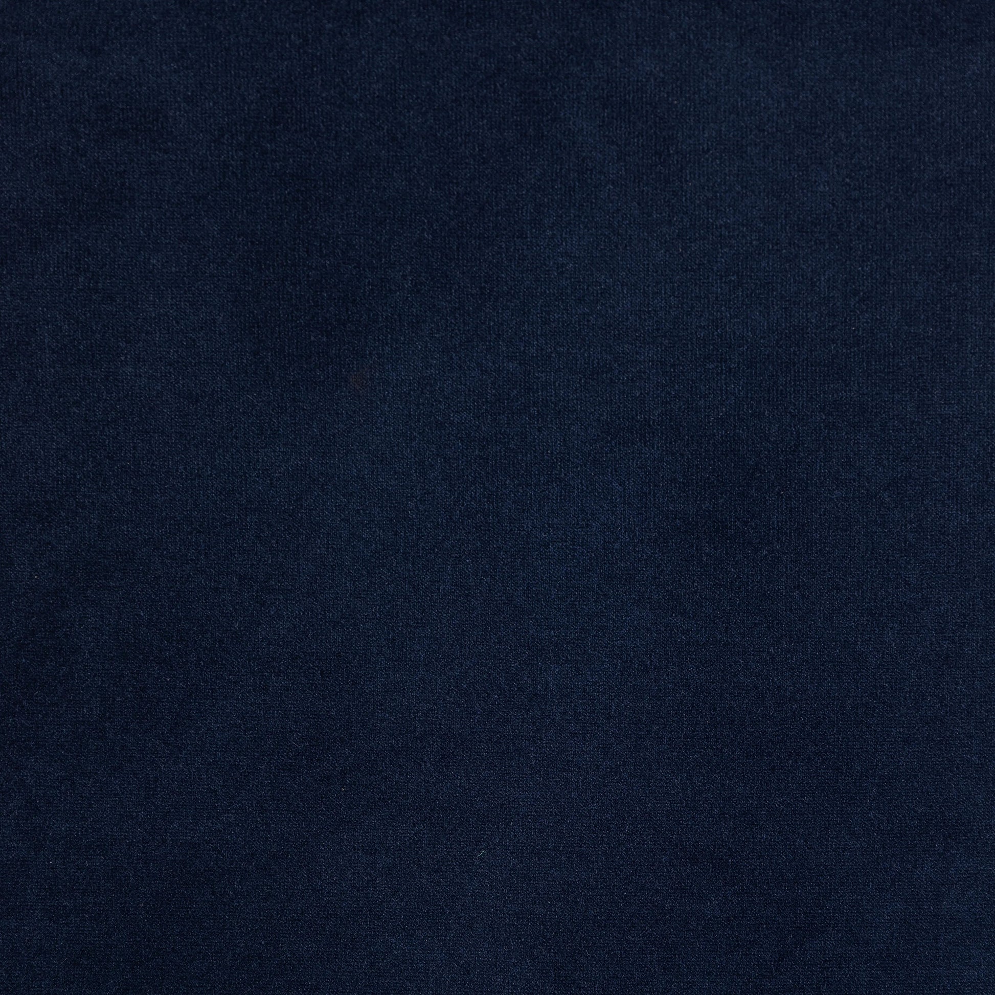 This low, tailored midcentury silhouette is upholstered in a velvety navy fabric, with dramatic blind tufting for texture.Collection: Kensingto Amethyst Home provides interior design, new home construction design consulting, vintage area rugs, and lighting in the Des Moines metro area.