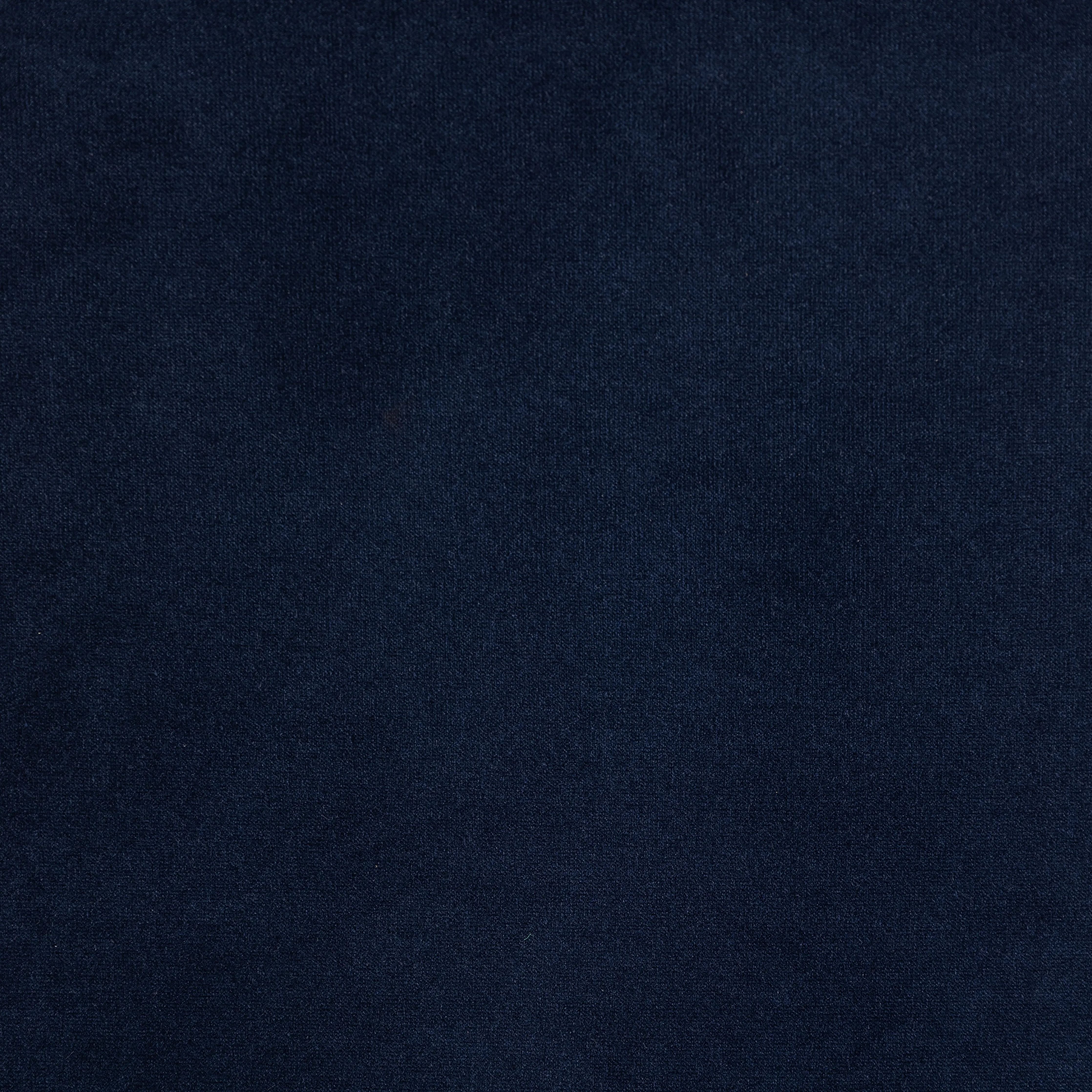 This low, tailored midcentury silhouette is upholstered in a velvety navy fabric, with dramatic blind tufting for texture.Collection: Kensingto Amethyst Home provides interior design, new home construction design consulting, vintage area rugs, and lighting in the Des Moines metro area.