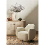 With the soft volume and exaggerated curves, the Enya Gibson White Swivel Chair is upholstered with high-performance fabric atop a plinth-style swivel base. Performance fabrics are specially created to withstand spills, stains, high traffic, and wear, ensuring long-term comfort and unmatched durability. Amethyst Home provides interior design services, furniture, rugs, and lighting in the Charlotte metro area.