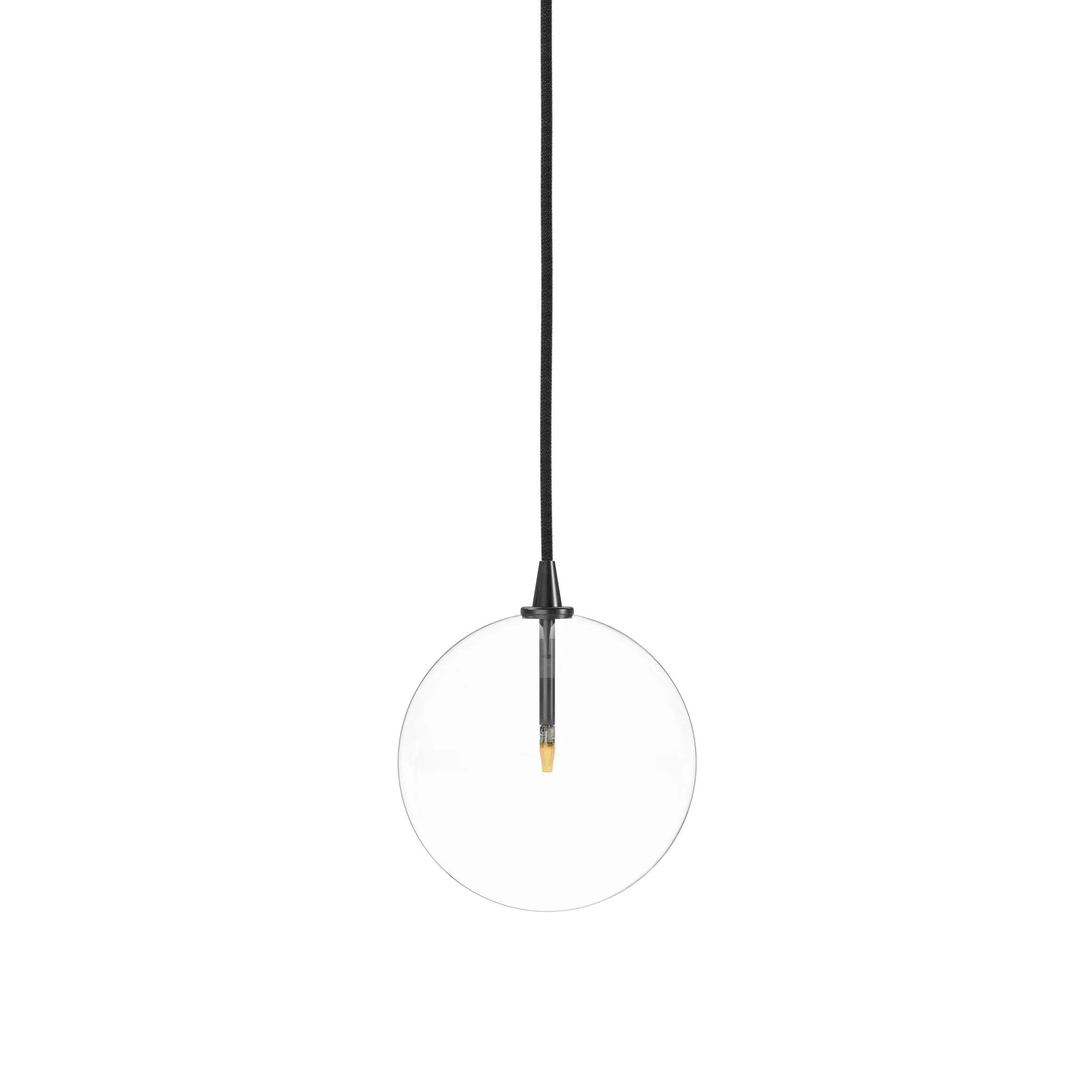 A single glass sphere dangles for a stunning effect. Each globe is individually blown, shaped and sculpted by hand through a one-hour process. The finish on the brass frame is achieved through a specialized process that turns the brass into an almost black hue before the rod is polished smooth. Brass and glass are 98% recyclable. Amethyst Home provides interior design, new home construction design consulting, vintage area rugs, and lighting in the Dallas metro area.