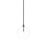 Featuring Glass Black Gunmetal Clear Glass Globe Medium Pendant by Four Hands at Amethyst Home. A single glass sphere dangles for a stunning effect. Each globe is individually blown, shaped and sculpted by hand through a one-hour process. The finish on the brass frame is achieved through a specialized process that turns the brass into an almost black hue . Amethyst Home provides interior design, new home construction design consulting, vintage area rugs, and lighting in the Los Angeles metro area.