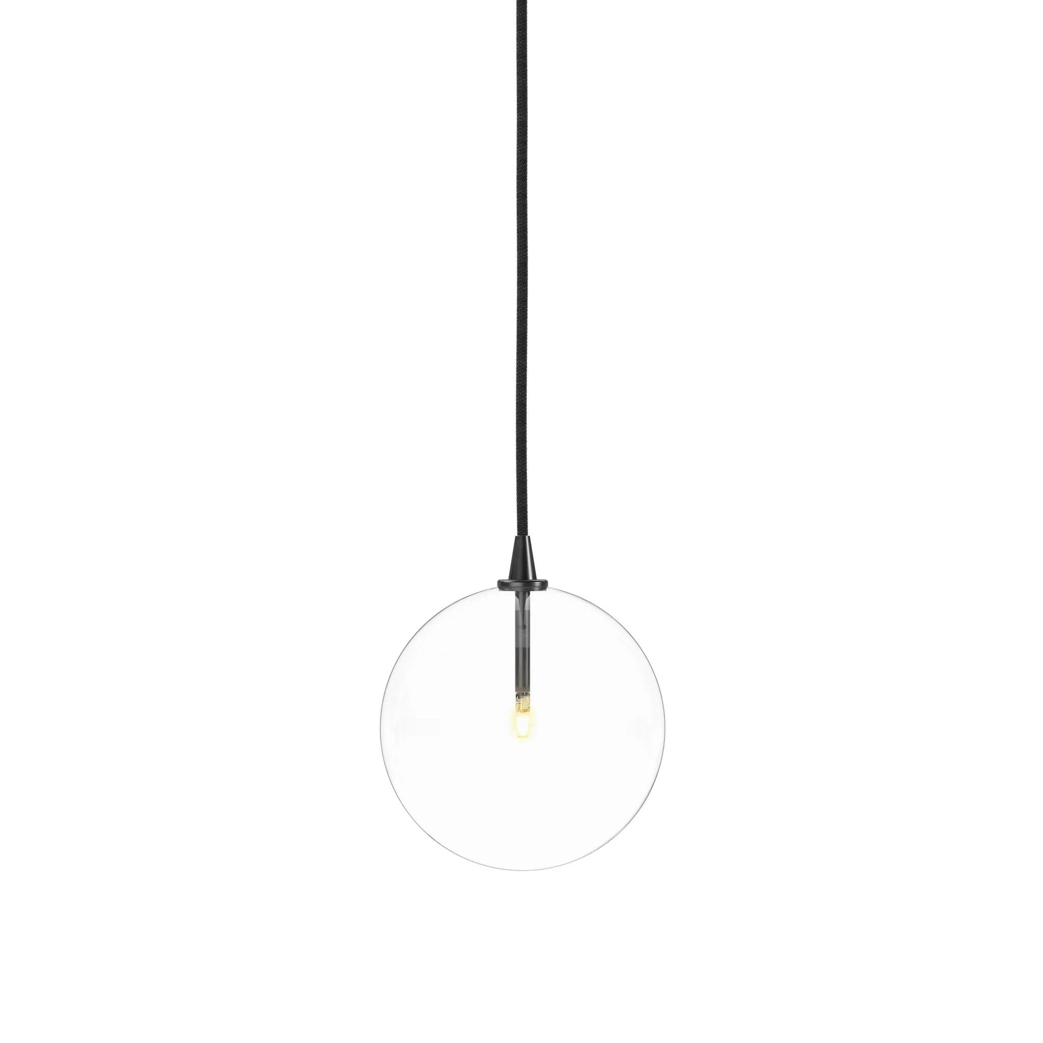 Featuring Glass Black Gunmetal Clear Glass Globe Medium Pendant by Four Hands at Amethyst Home. A single glass sphere dangles for a stunning effect. Each globe is individually blown, shaped and sculpted by hand through a one-hour process. The finish on the brass frame is achieved through a specialized process that turns the brass into an almost black hue . Amethyst Home provides interior design, new home construction design consulting, vintage area rugs, and lighting in the Los Angeles metro area.