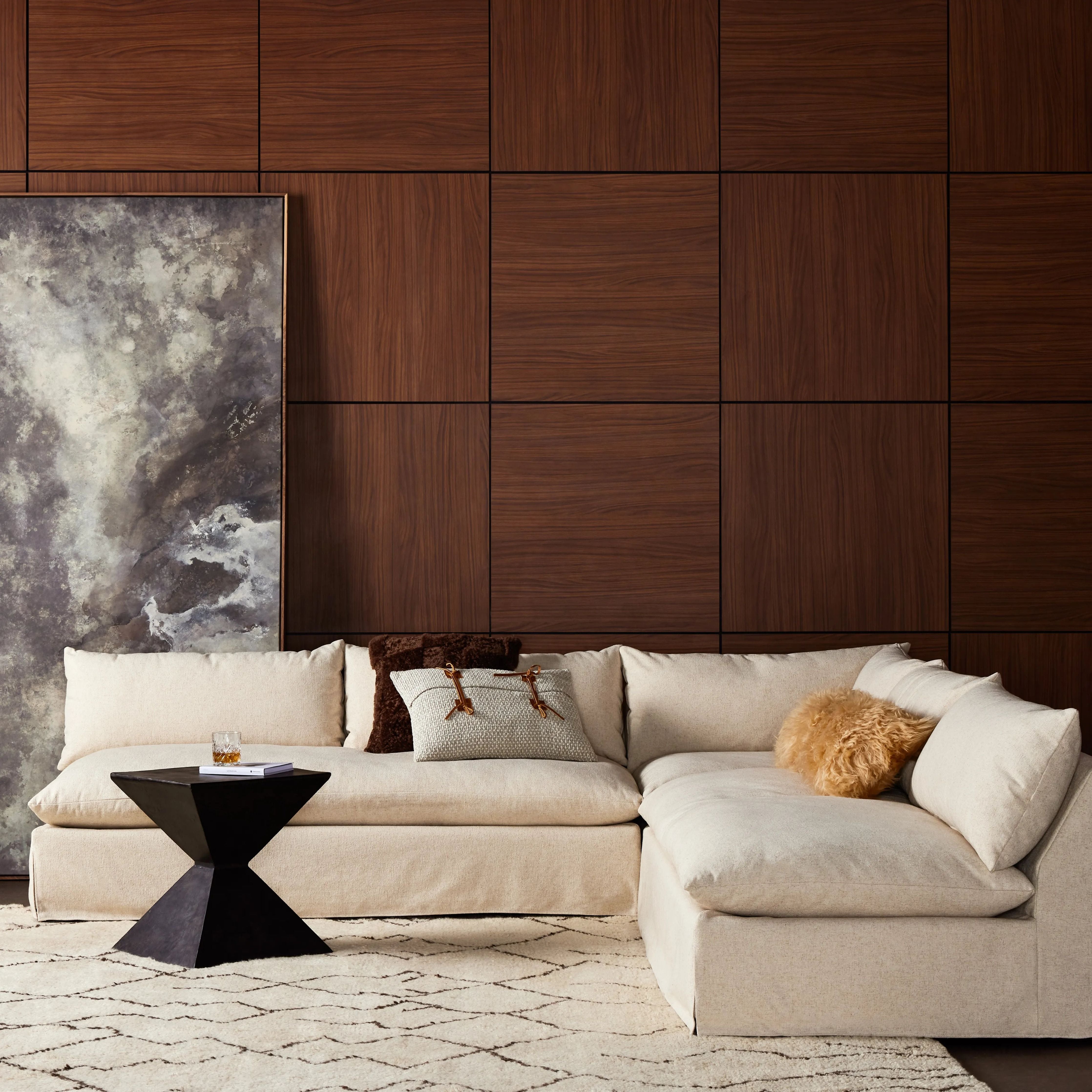 A new slipcovered version to a classic silhouette. A streamlined sectional is topped in a fully removable slipcover crafted from a soft linen/cotton/poly blend. Subtle texture throughout brings a casual coastal look and movement to the entire piece. Amethyst Home provides interior design, new home construction design consulting, vintage area rugs, and lighting in the Scottsdale metro area.