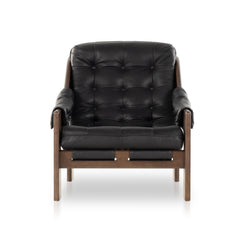 Featuring Halston Black Leather Chair by Four Hands at Amethyst Home. Featured in one of our recent home tours -- the Halston leather chair is the ultimate in comfort and surprised everyone who sat in it.  It has a hammock sling style construction that just feels sooo right.
Overall Dimensions: 30"W x 34.25"L x 32"HMaterials: Top Grain Leather, Solid AshSeat . Amethyst Home provides interior design, new home construction design consulting, vintage area rugs, and lighting in the Houston metro area.