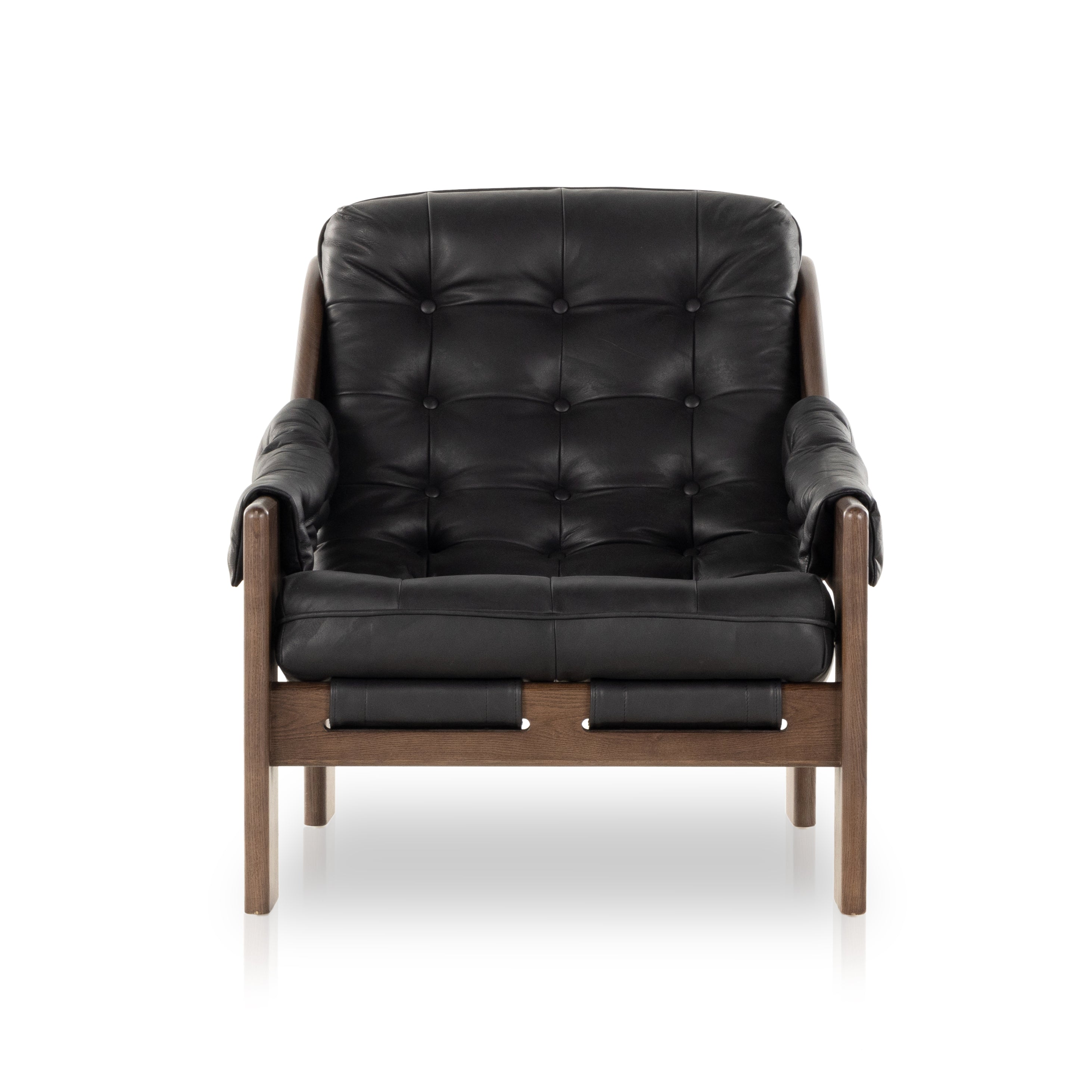 A Seventies-era style inspired by a flea market find, a dramatically tufted sling seat of black top-grain leather angles at the just-right pitch for total comfort, with wide, brown ash framing. Amethyst Home provides interior design, new home construction design consulting, vintage area rugs, and lighting in the Houston metro area.