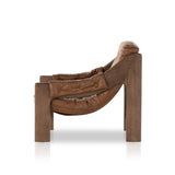 Featuring Halston Heirloom Sienna Chair by Four Hands at Amethyst Home. A Seventies-era style inspired by a flea market find, a dramatically tufted sling seat of black top-grain leather angles at the just-right pitch for total comfort, with wide, brown ash framing. Sourced from one of the oldest family-owned tanneries in Italy's Bassano del Grappa, heirloo. Amethyst Home provides interior design, new home construction design consulting, vintage area rugs, and lighting in the Des Moines metro area.