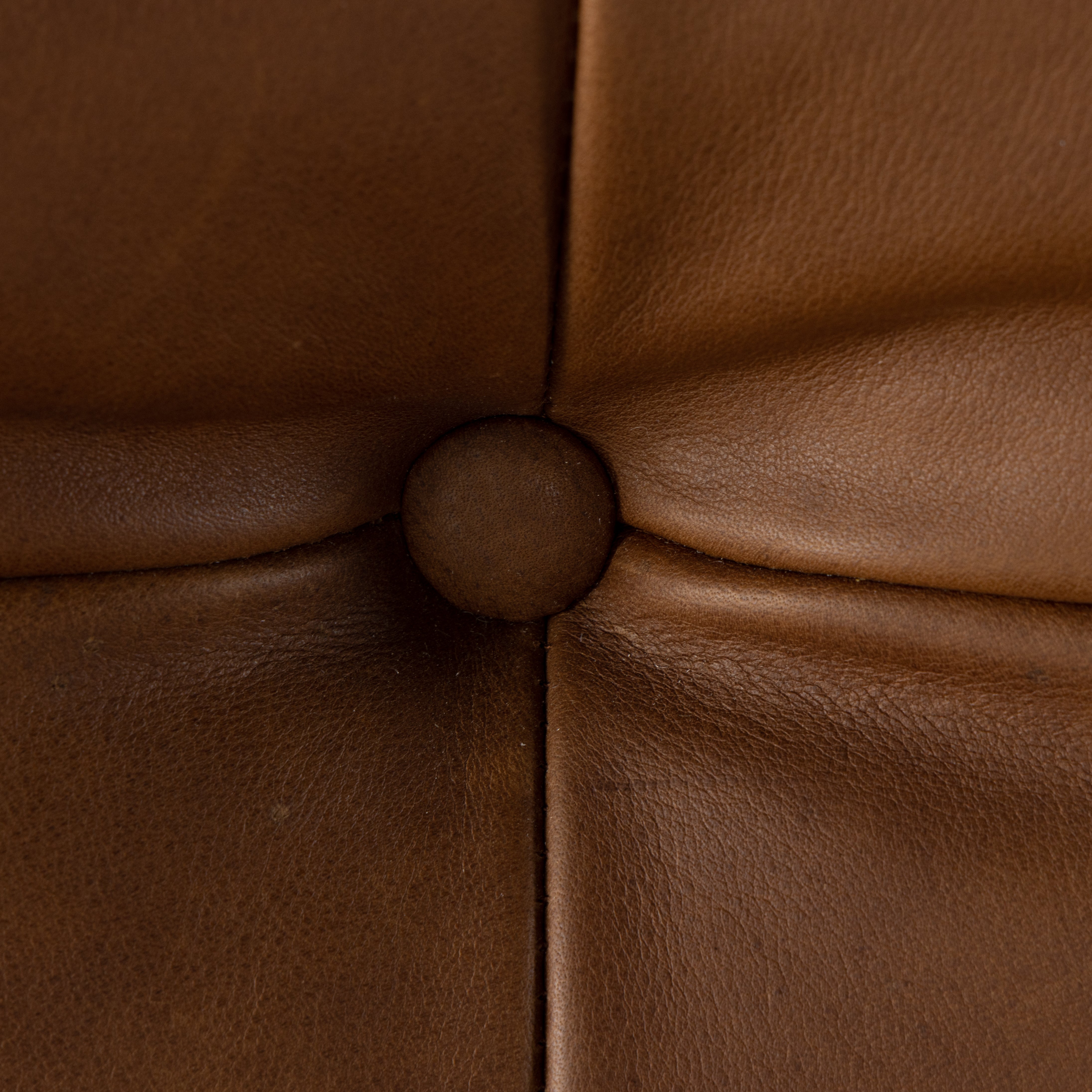 Featuring Halston Heirloom Sienna Chair by Four Hands at Amethyst Home. A Seventies-era style inspired by a flea market find, a dramatically tufted sling seat of black top-grain leather angles at the just-right pitch for total comfort, with wide, brown ash framing. Sourced from one of the oldest family-owned tanneries in Italy's Bassano del Grappa, heirloom lea. Amethyst Home provides interior design, new home construction design consulting, vintage area rugs, and lighting in the Miami metro area.