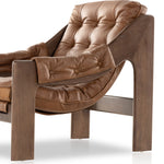 Featuring Halston Heirloom Sienna Chair by Four Hands at Amethyst Home. A Seventies-era style inspired by a flea market find, a dramatically tufted sling seat of black top-grain leather angles at the just-right pitch for total comfort, with wide, brown ash framing. Sourced from one of the oldest family-owned tanneries in Italy's Bassano del Grappa, hei. Amethyst Home provides interior design, new home construction design consulting, vintage area rugs, and lighting in the Salt Lake City metro area.