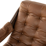 Featuring Halston Heirloom Sienna Chair by Four Hands at Amethyst Home. A Seventies-era style inspired by a flea market find, a dramatically tufted sling seat of black top-grain leather angles at the just-right pitch for total comfort, with wide, brown ash framing. Sourced from one of the oldest family-owned tanneries in Italy's Bassano del Grappa, heirloo. Amethyst Home provides interior design, new home construction design consulting, vintage area rugs, and lighting in the Washington metro area.