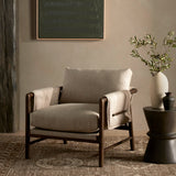 Details make the chair. With poly-blend performance fabric that wraps each arm, faux toggles add an element of interest to midcentury-inspired seating in a wheat hue, with softly sculpted parawood framing carrying out a beautiful neutral look. Amethyst Home provides interior design, new construction, custom furniture, and area rugs in the Calabasas metro area.