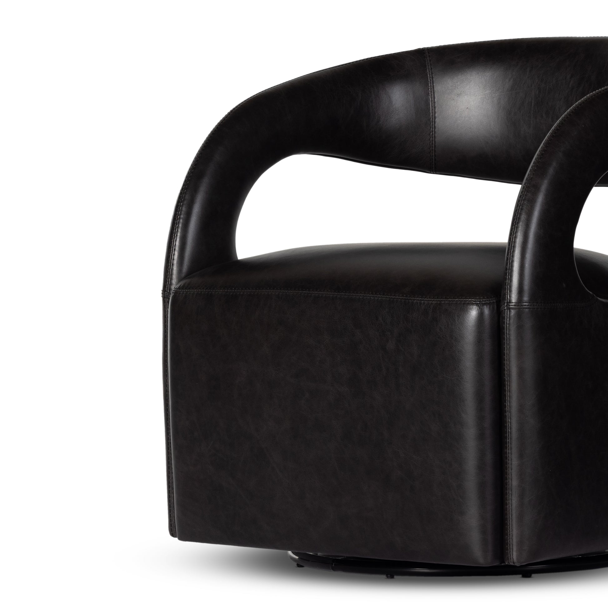 This 360-swivel update of the fan-favorite stationary design makes quite the statement. Well curved and finely sculpted, black top-grain leather exclusive to Four Hands makes a uniquely shapely statement in any room.Overall Dimensions: 26"w x 26"d x 29"hColors: Sonoma ButterscotchMaterials: Top Grain LeatherWeight: 51.26Volume: 13. Amethyst Home provides interior design, new home construction design consulting, vintage area rugs, and lighting in the Nashville metro area.