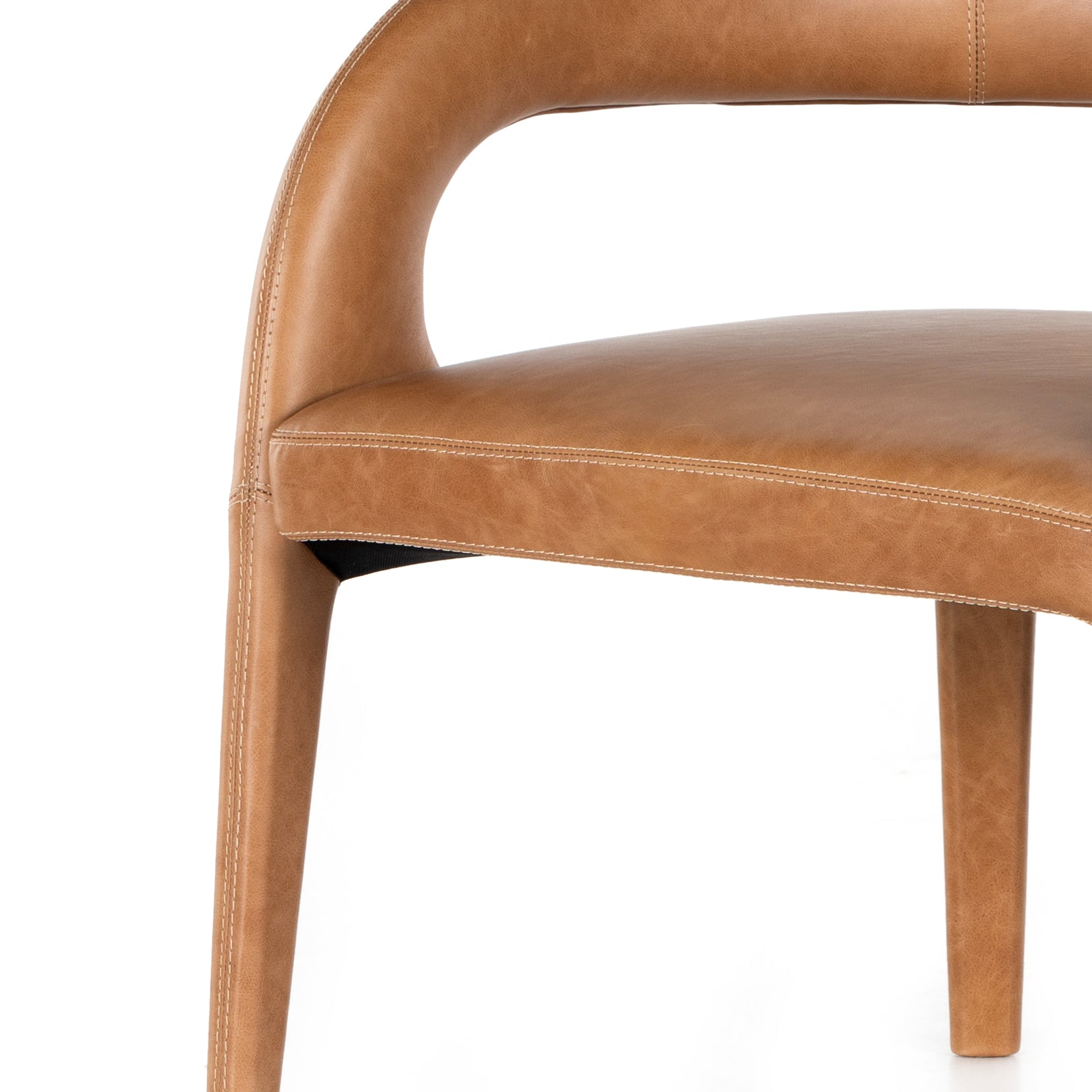 Strike a pose. Well curved and finely sculpted, butterscotch-colored top-grain leather exclusive to Four Hands makes a uniquely shapely statement in any room. Amethyst Home provides interior design, new construction, custom furniture, and area rugs in the Omaha metro area.