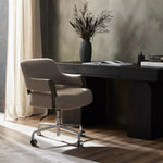 Featuring Henrik Alcala Fawn Desk Chair by Four Hands at Amethyst Home. Updating a midcentury form for the modern office, a 360-degree swivel chair strikes a just-right balance between vintage and contemporary. With warm parawood arms and a comfortable, height-adjustable seat of high-performance fabric. Performance fabrics are specially created to withstand sp. Amethyst Home provides interior design, new home construction design consulting, vintage area rugs, and lighting in the Dallas metro area.