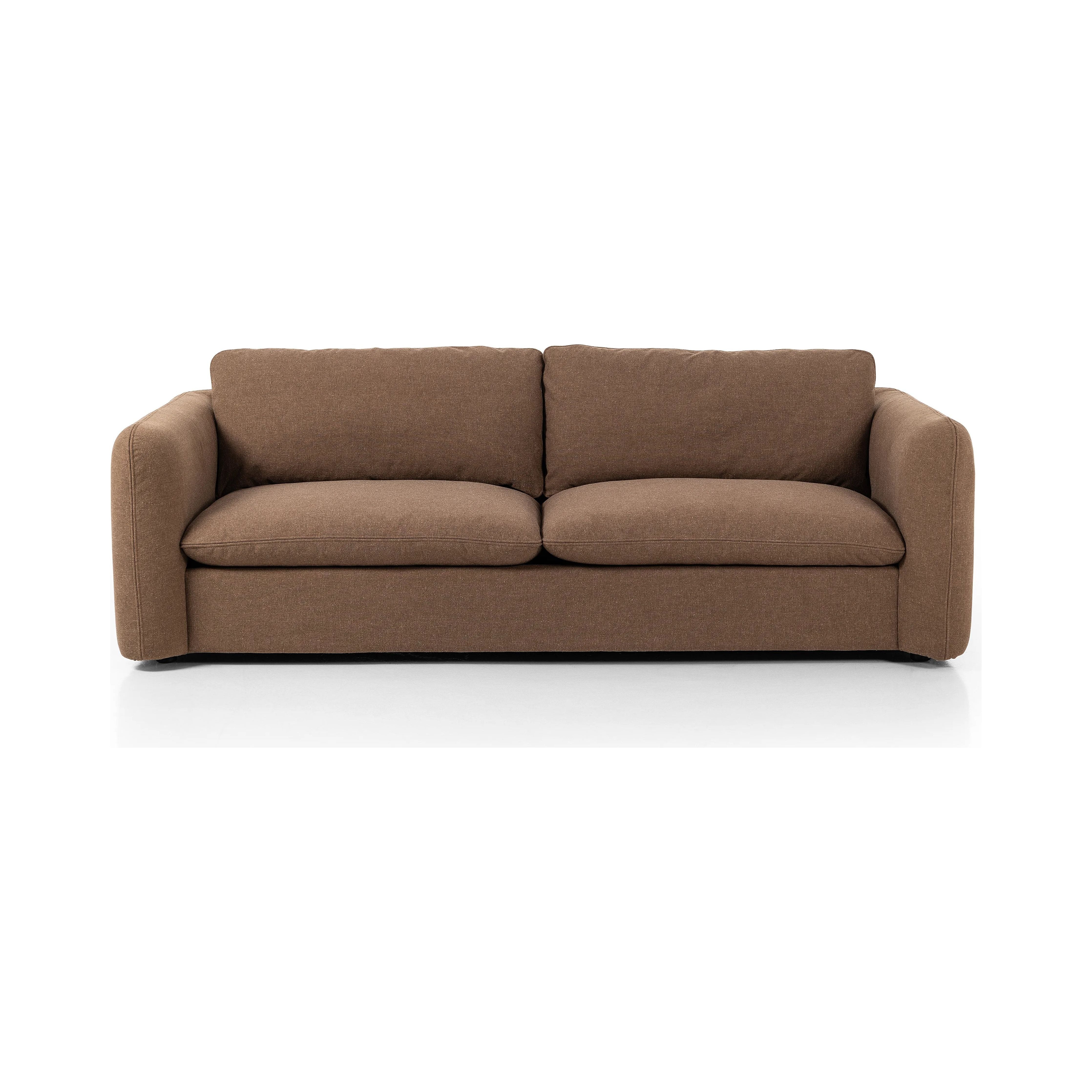 Inflated, pillow-inspired cushioning all around brings cozy comfort to the room. High-performance linen offers the best of both worlds on this plush and welcoming sofa.  Inflated arms, feather-fiber blend cushioning and a soft, durable linen fabric make this spacious sofa a smart solution for the comfort-driven living space.Collection: Kensingto Amethyst Home provides interior design, new home construction design consulting, vintage area rugs, and lighting in the Newport Beach metro area.