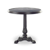 For a fresh take on classic Parisian styling, an ornate cast iron base is topped with black marble.Collection: Rockwel Amethyst Home provides interior design, new home construction design consulting, vintage area rugs, and lighting in the Washington metro area.