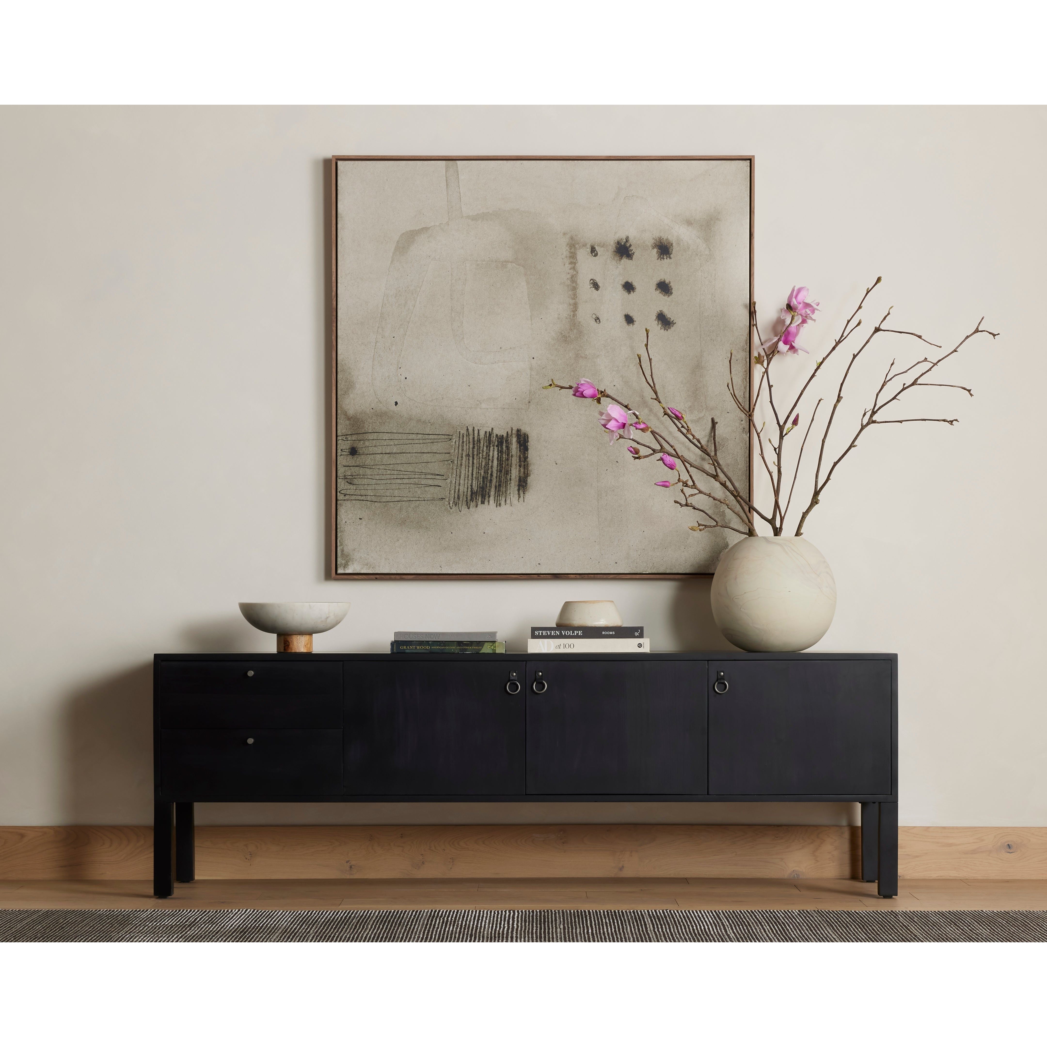 Beautifully simple in spirit. Black-washed dry poplar forms a clean-lined media console with faux dovetail joinery plus iron and leather hardware, for a material-driven update to Shaker-inspired styling. Rear cutouts for cord management. Amethyst Home provides interior design, new construction, custom furniture, and area rugs in the Omaha metro area.