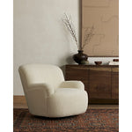 Featuring Kadon Natural Swivel Chair by Four Hands at Amethyst Home. Kadon Natural Swivel Chair is a high wing back pairs with softly rolled arms for a curvy look and supportive sit. Cream-colored shearling-upholstered seating tops a 360-degree swivel.
Overall Dimensions: 35.50"W x 39"L x 32.75"HWeight: 77.6 lbsVolume: 22.92 cu ftSeat Depth: 24.5"Seat Height: 17.5"Arm Height from Floor: 21.75". Amethyst Home provides interior design services, furniture, rugs, and lighting in the Austin metro area.