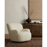 Featuring Kadon Natural Swivel Chair by Four Hands at Amethyst Home. Kadon Natural Swivel Chair is a high wing back pairs with softly rolled arms for a curvy look and supportive sit. Cream-colored shearling-upholstered seating tops a 360-degree swivel.
Overall Dimensions: 35.50"W x 39"L x 32.75"HWeight: 77.6 lbsVolume: 22.92 cu ftSeat Depth: 24.5"Seat Height: 17.5"Arm Height from Floor: 21.75". Amethyst Home provides interior design services, furniture, rugs, and lighting in the Austin metro area.
