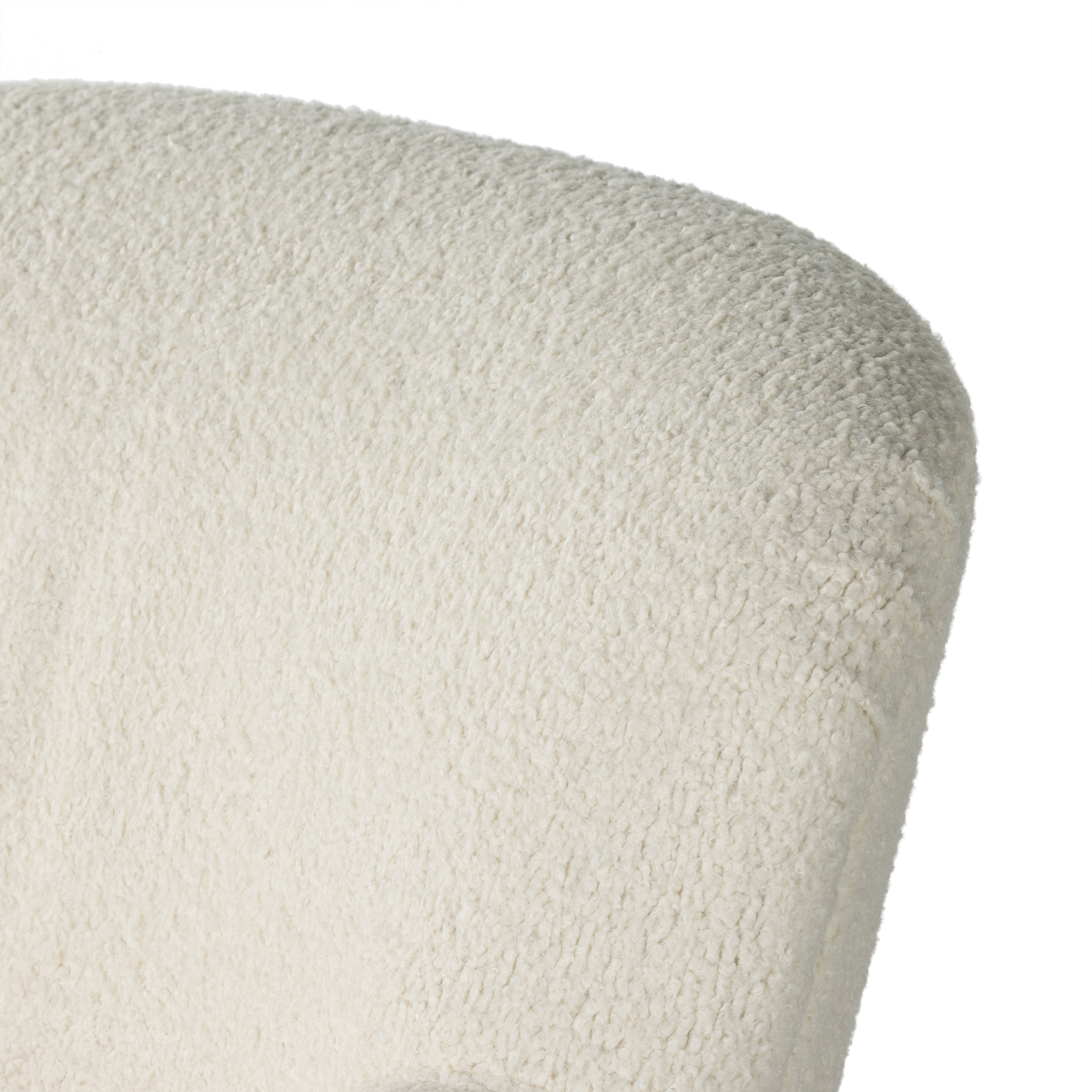 Kadon Natural Swivel Chair is a high wing back pairs with softly rolled arms for a curvy look and supportive sit. Cream-colored shearling-upholstered seating tops a 360-degree swivel. Amethyst Home provides interior design services, furniture, rugs, and lighting in the Calabasas metro area.