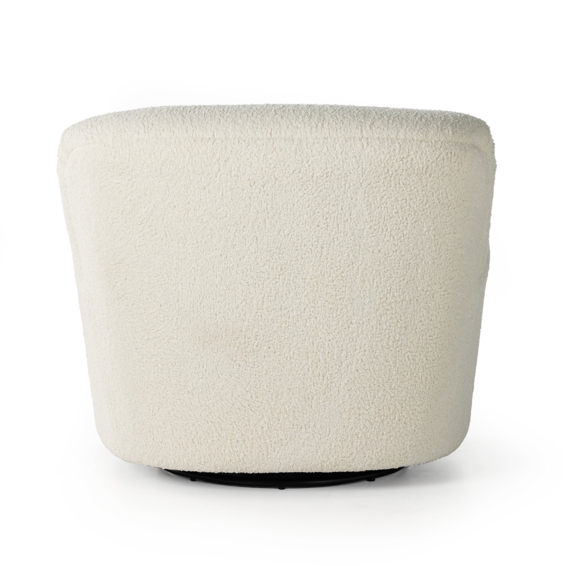 Kadon Natural Swivel Chair is a high wing back pairs with softly rolled arms for a curvy look and supportive sit. Cream-colored shearling-upholstered seating tops a 360-degree swivel. Amethyst Home provides interior design services, furniture, rugs, and lighting in the Miami metro area.