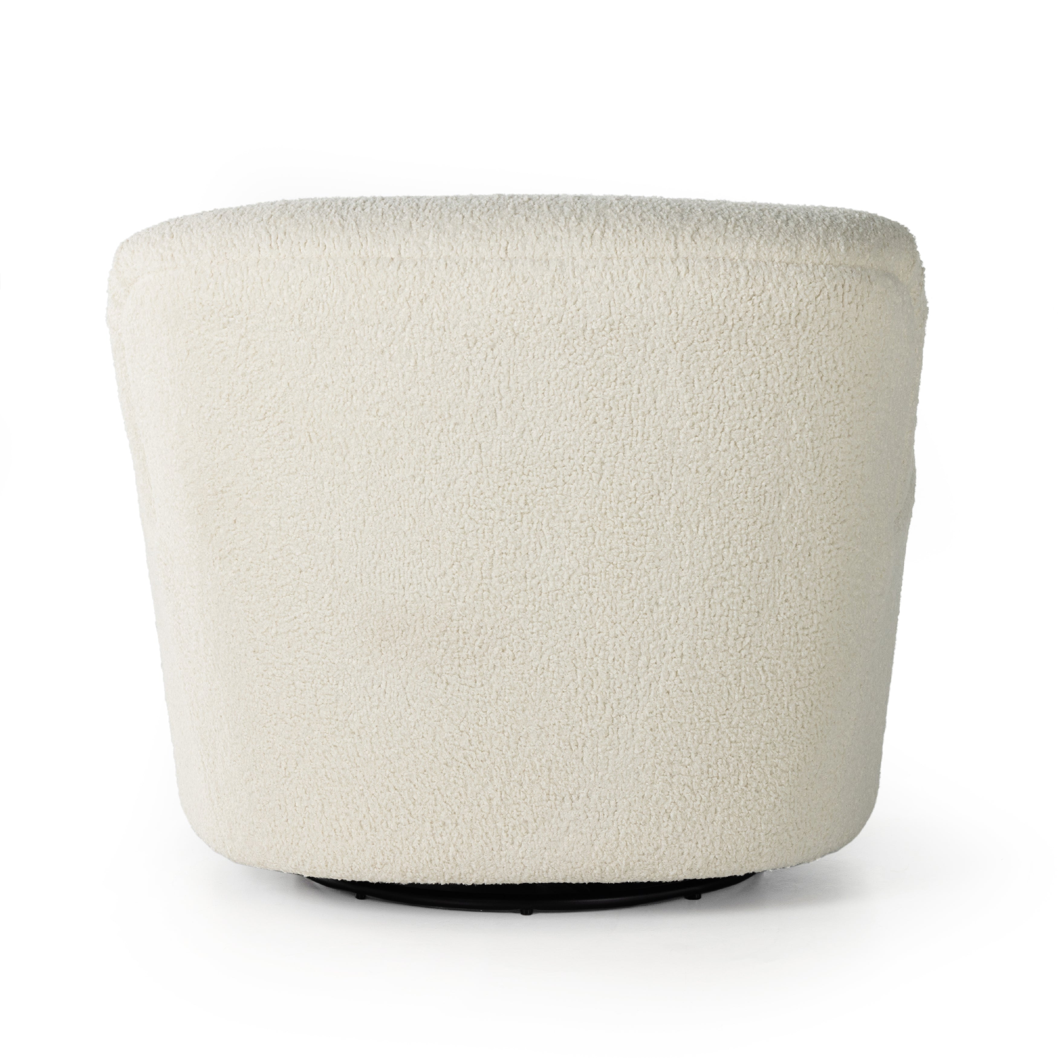 Kadon Natural Swivel Chair is a high wing back pairs with softly rolled arms for a curvy look and supportive sit. Cream-colored shearling-upholstered seating tops a 360-degree swivel. Amethyst Home provides interior design services, furniture, rugs, and lighting in the Miami metro area.