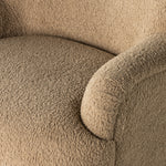 Simply classic. The Kadon Swivel Chair features a high wing back and pairs with softly rolled arms for a curvy look and supportive sit. Camel-colored shearling-upholstered seating tops a 360-degree swivel for total modernity. Amethyst Home provides interior design, new home construction design consulting, vintage area rugs, and lighting in the Newport Beach metro area.