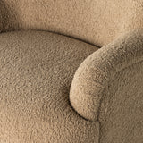 Simply classic. The Kadon Swivel Chair features a high wing back and pairs with softly rolled arms for a curvy look and supportive sit. Camel-colored shearling-upholstered seating tops a 360-degree swivel for total modernity. Amethyst Home provides interior design, new home construction design consulting, vintage area rugs, and lighting in the Newport Beach metro area.