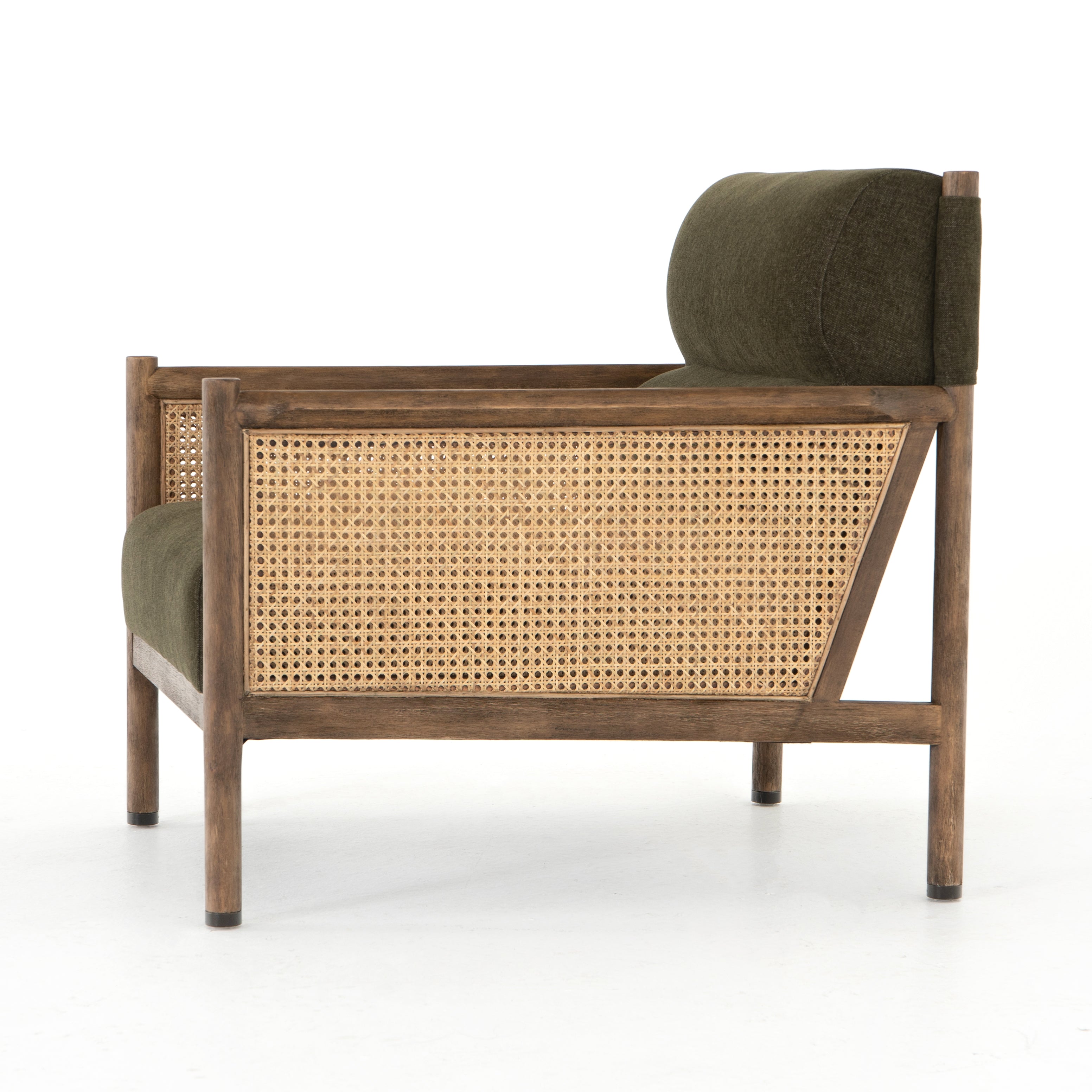 Craft a Parisian air with French-inspired seating. With a chenille-like texture and earthy olive hue, high performance-upholstered seating is perfectly positioned for comfort, with parawood framing and woven sides of natural cane. Performance fabrics are specially created to withstand spills, stains, high traffic and wear, ensuring long-term comfort and unmatched durability. Amethyst Home provides interior design, new construction, custom furniture and area rugs in the Seattle metro area