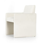 High style meets everyday sensibility. Upholstered Kima Fayette Cloud Dining Chair in cream-colored high-performance fabric, soft, voluminous shaping and grand scale dole a dramatic look to this sophisticated seating style. Amethyst Home provides interior design, new home construction design consulting, vintage area rugs, and lighting in the Miami metro area.