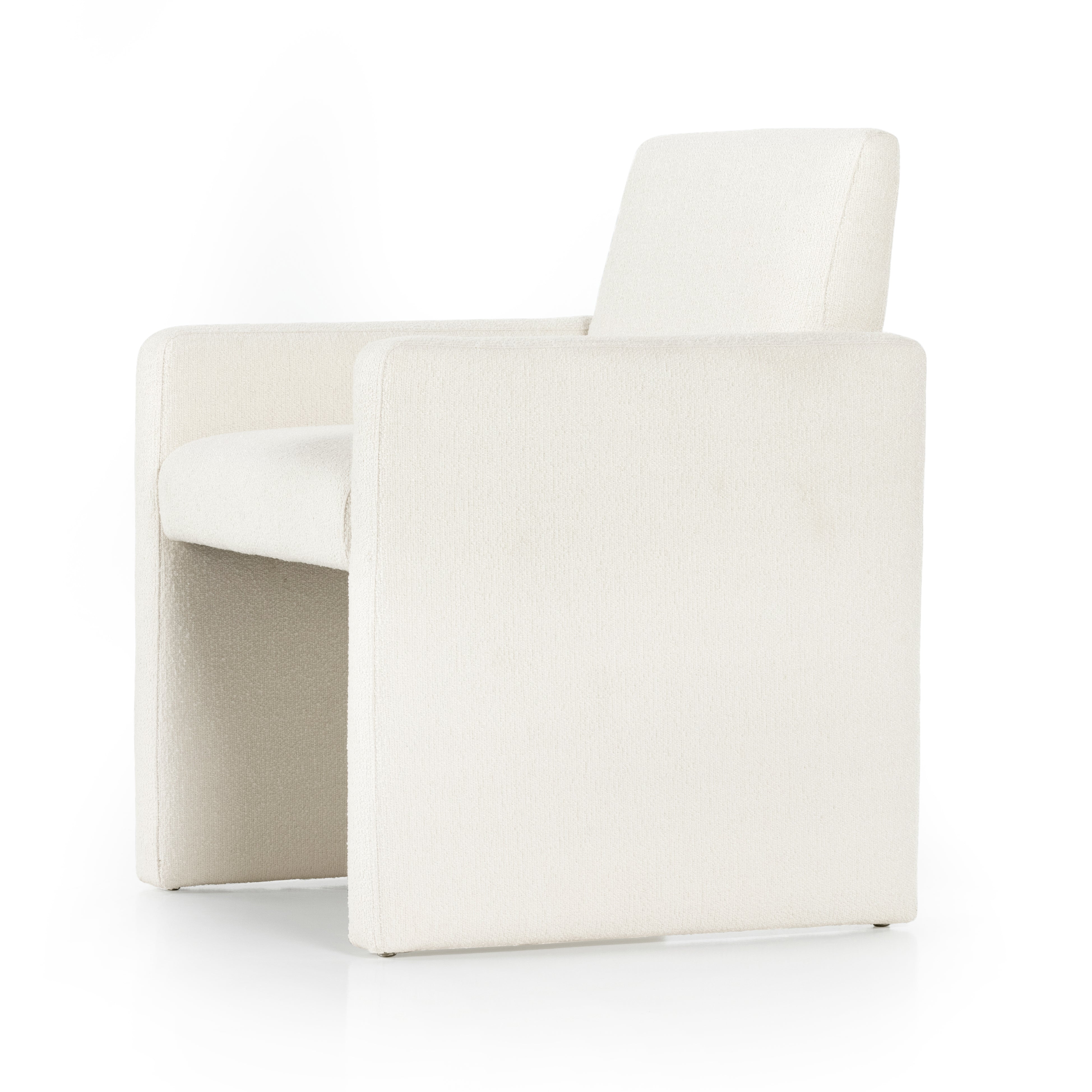 High style meets everyday sensibility. Upholstered Kima Fayette Cloud Dining Chair in cream-colored high-performance fabric, soft, voluminous shaping and grand scale dole a dramatic look to this sophisticated seating style. Amethyst Home provides interior design, new home construction design consulting, vintage area rugs, and lighting in the Miami metro area.