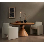 High style meets everyday sensibility. Upholstered Kima Fayette Cloud Dining Chair in cream-colored high-performance fabric, soft, voluminous shaping and grand scale dole a dramatic look to this sophisticated seating style. Amethyst Home provides interior design, new home construction design consulting, vintage area rugs, and lighting in the Omaha metro area.