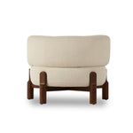 Sink in to plush all-encompassing comfort on this wrap-around accent chair. Designed with a thick cushioned back and fixed suspension-style construction for ultimate comfort. Upholstered in a textural performance fabric. Performance fabrics are specially created to withstand spills, stains, high traffic and wear, ensuring long-term comfort and unmatched durability. Amethyst Home provides interior design, new construction, custom furniture, and area rugs in the Boston metro area.