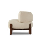 Sink in to plush all-encompassing comfort on this wrap-around accent chair. Designed with a thick cushioned back and fixed suspension-style construction for ultimate comfort. Upholstered in a textural performance fabric. Performance fabrics are specially created to withstand spills, stains, high traffic and wear, ensuring long-term comfort and unmatched durability. Amethyst Home provides interior design, new construction, custom furniture, and area rugs in the Newport Beach metro area.