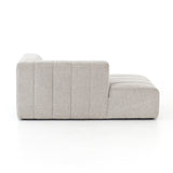 Wide, vertical channels and low styling speaks to modish Italian influence. Sandstone-colored covering and modular components allow for versatility in any space. Left arm facing chaise to matching sectional. Amethyst Home provides interior design, new home construction design consulting, vintage area rugs, and lighting in the Portland metro area.