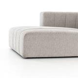 Wide, vertical channels and low styling speaks to modish Italian influence. Sandstone-colored covering and modular components allow for versatility in any space. Left arm facing chaise to matching sectional. Amethyst Home provides interior design, new home construction design consulting, vintage area rugs, and lighting in the Winter Garden metro area.