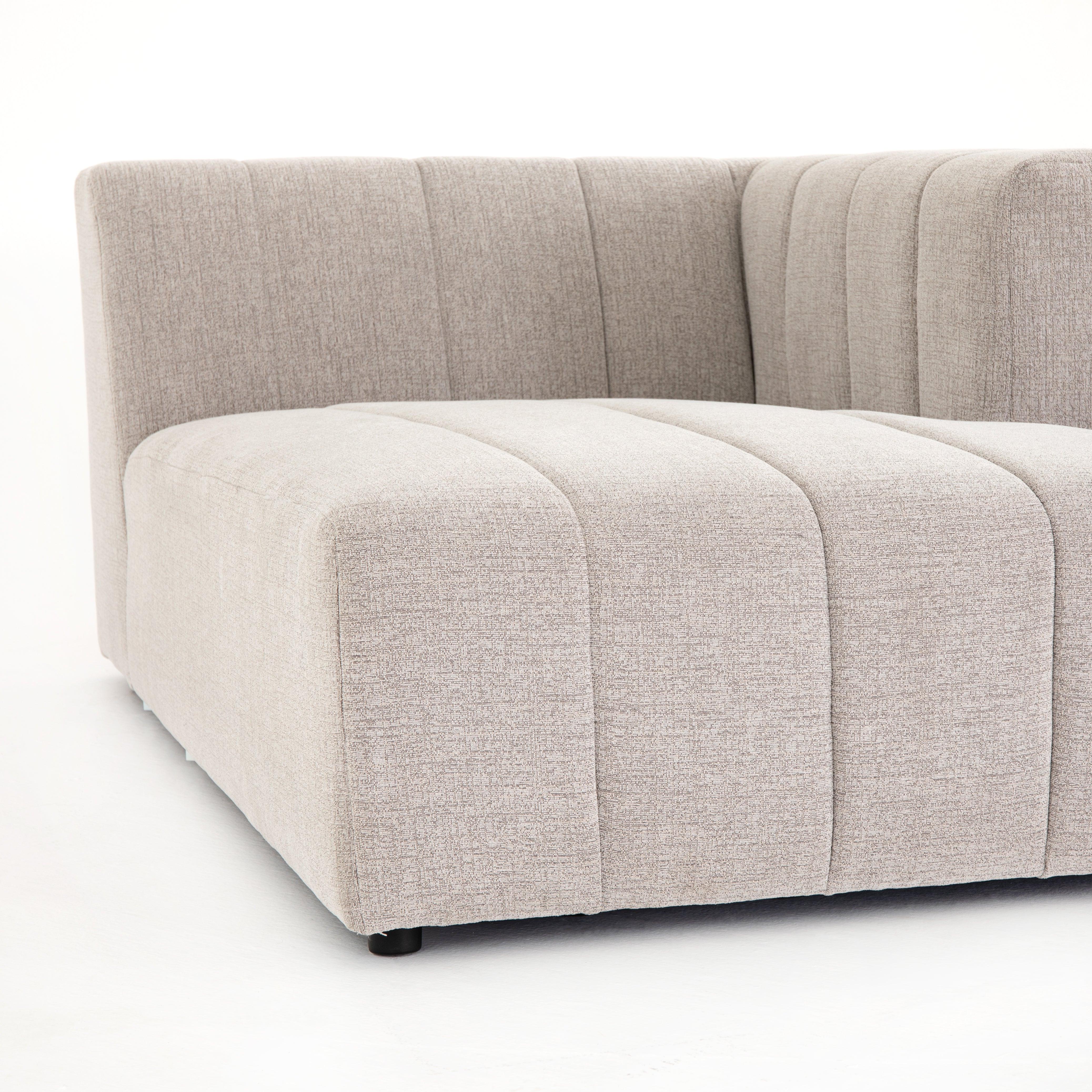 Featuring Langham Napa Sandstone Right Chaise by Four Hands at Amethyst Home. Wide, vertical channels and low styling speaks to modish Italian influence. Sandstone-colored covering and modular components allow for versatility in any space. Right arm facing piece to matching sectional. Performance fabrics are specially created to withstand spills, stains. Amethyst Home provides interior design, new home construction design consulting, vintage area rugs, and lighting in the Winter Garden metro area.