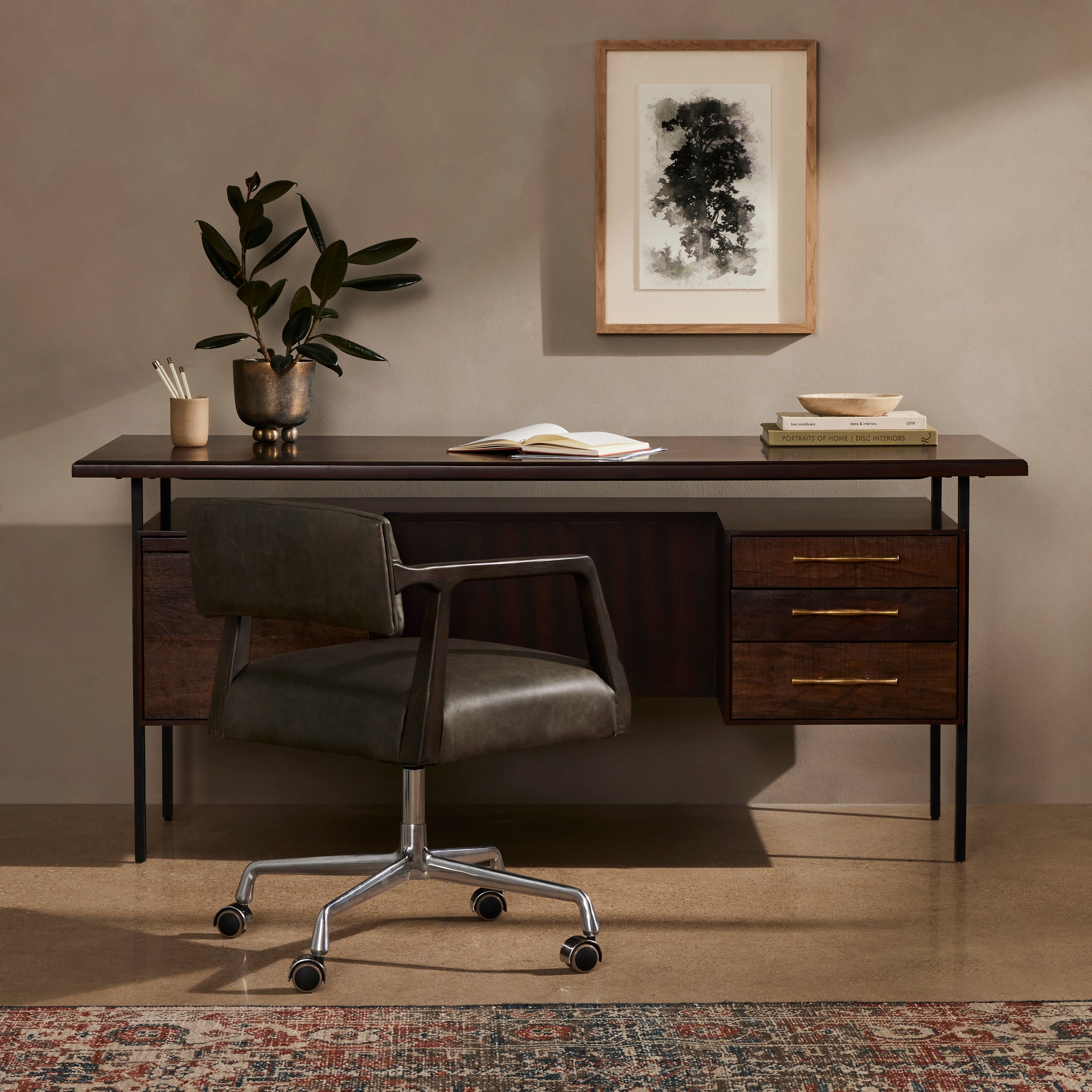 This mid-century inspired lawyer's desk offers heavy-duty storage with two-sided cabinetry. A floating top and simple iron legs keeps the look light and modern. Solid acacia casing with reclaimed peroba wood door and drawer fronts. This piece is designed in collaboration with Thomas Bina. Amethyst Home provides interior design, new construction, custom furniture, and area rugs in the Salt Lake City metro area.