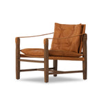 Featuring Lenz Kennison Cognac Chair by Four Hands at Amethyst Home. This material-driven take on safari styling features cognac-hued Italian-designed leather that's been lightly sanded and buffed by hand for a suede-like feel. With a tufted sling-style seat, strap arm and pivot back, this vintage-feeling accent chair makes a chic statement wherever it's styled.
Collection: WestgateC. Amethyst Home provides interior design, new construction, custom furniture, and area rugs in the Miami metro area.