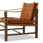 Featuring Lenz Kennison Cognac Chair by Four Hands at Amethyst Home. This material-driven take on safari styling features cognac-hued Italian-designed leather that's been lightly sanded and buffed by hand for a suede-like feel. With a tufted sling-style seat, strap arm and pivot back, this vintage-feeling accent chair makes a chic statement wherever it's styled.
Collection: Westg. Amethyst Home provides interior design, new construction, custom furniture, and area rugs in the Nashville metro area.