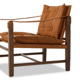 Featuring Lenz Kennison Cognac Chair by Four Hands at Amethyst Home. This material-driven take on safari styling features cognac-hued Italian-designed leather that's been lightly sanded and buffed by hand for a suede-like feel. With a tufted sling-style seat, strap arm and pivot back, this vintage-feeling accent chair makes a chic statement wherever it's styled.
Collection: Westg. Amethyst Home provides interior design, new construction, custom furniture, and area rugs in the Nashville metro area.
