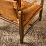 Featuring Lenz Kennison Cognac Chair by Four Hands at Amethyst Home. This material-driven take on safari styling features cognac-hued Italian-designed leather that's been lightly sanded and buffed by hand for a suede-like feel. With a tufted sling-style seat, strap arm and pivot back, this vintage-feeling accent chair makes a chic statement wherever it's styled.
Collection: Westg. Amethyst Home provides interior design, new construction, custom furniture, and area rugs in the San Diego metro area.