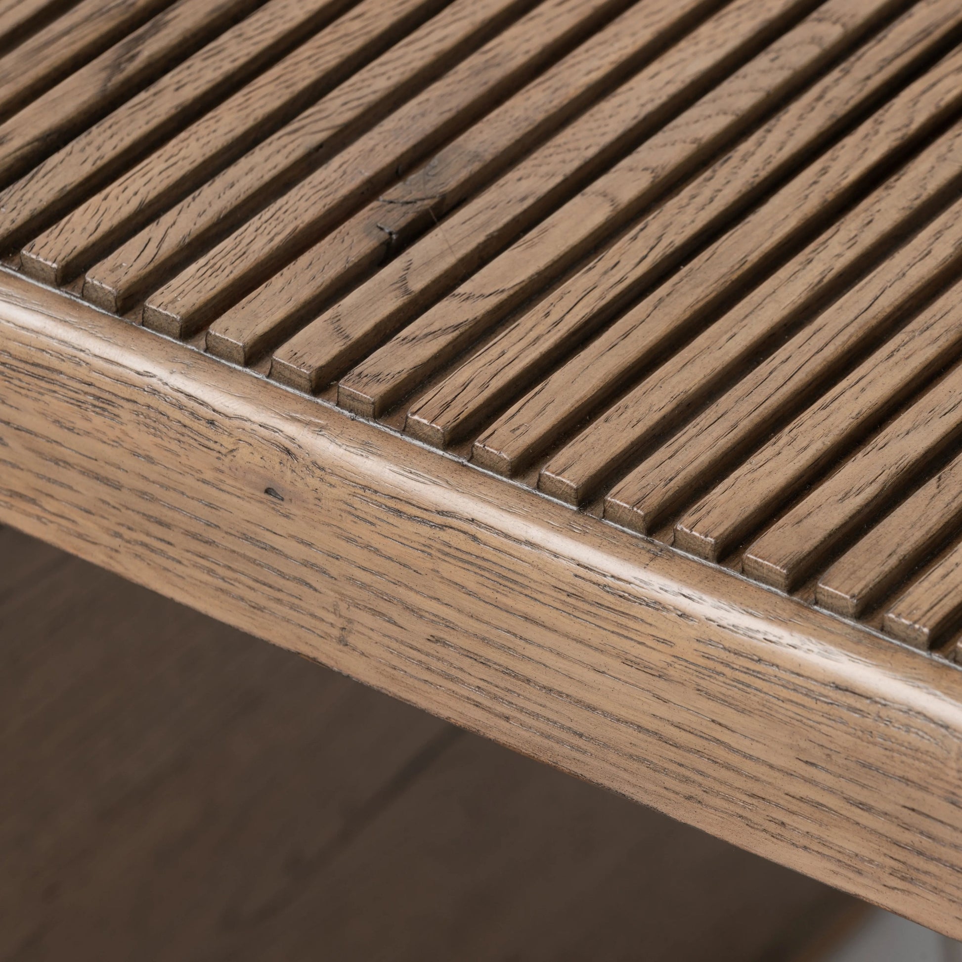 Made from rustic-finished oak, linear reeding and a curved shape define this midcentury-spirited end table. Designed in partnership with longtime Four Hands collaborator Thomas Bina and Brazilian designer Ronald Sasson.Collection: Bin Amethyst Home provides interior design, new home construction design consulting, vintage area rugs, and lighting in the Calabasas metro area.