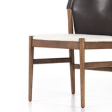 Featuring Lulu Espresso Leather Armless Dining Chair by Four Hands at Amethyst Home. Sleek, streamlined seating with a midcentury vibe. Lulu Espresso Leather Armless Dining Chair features a sling leather seatback and a faux shearling seat in liquid-repellent performance fabric. Frame and legs made of solid ash wood. Performance fabrics are specially created to withstand spills, stains, high tr. Amethyst Home provides interior design services, furniture, rugs, and lighting in the Miami metro area. 