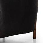 This updated take on the traditional tub chair pairs rich black top-grain leather with solid ash to shape a sculpted seat with exaggerated depth. Sourced from one of the oldest family-owned tanneries in Italyâ€™s Bassano del Grappa, heirloom leather is salvaged and processed from upcycled hides featuring an abundance of natural markings, scars and color variations. Amethyst Home provides interior design, new construction, custom furniture, and area rugs in the Austin metro area.