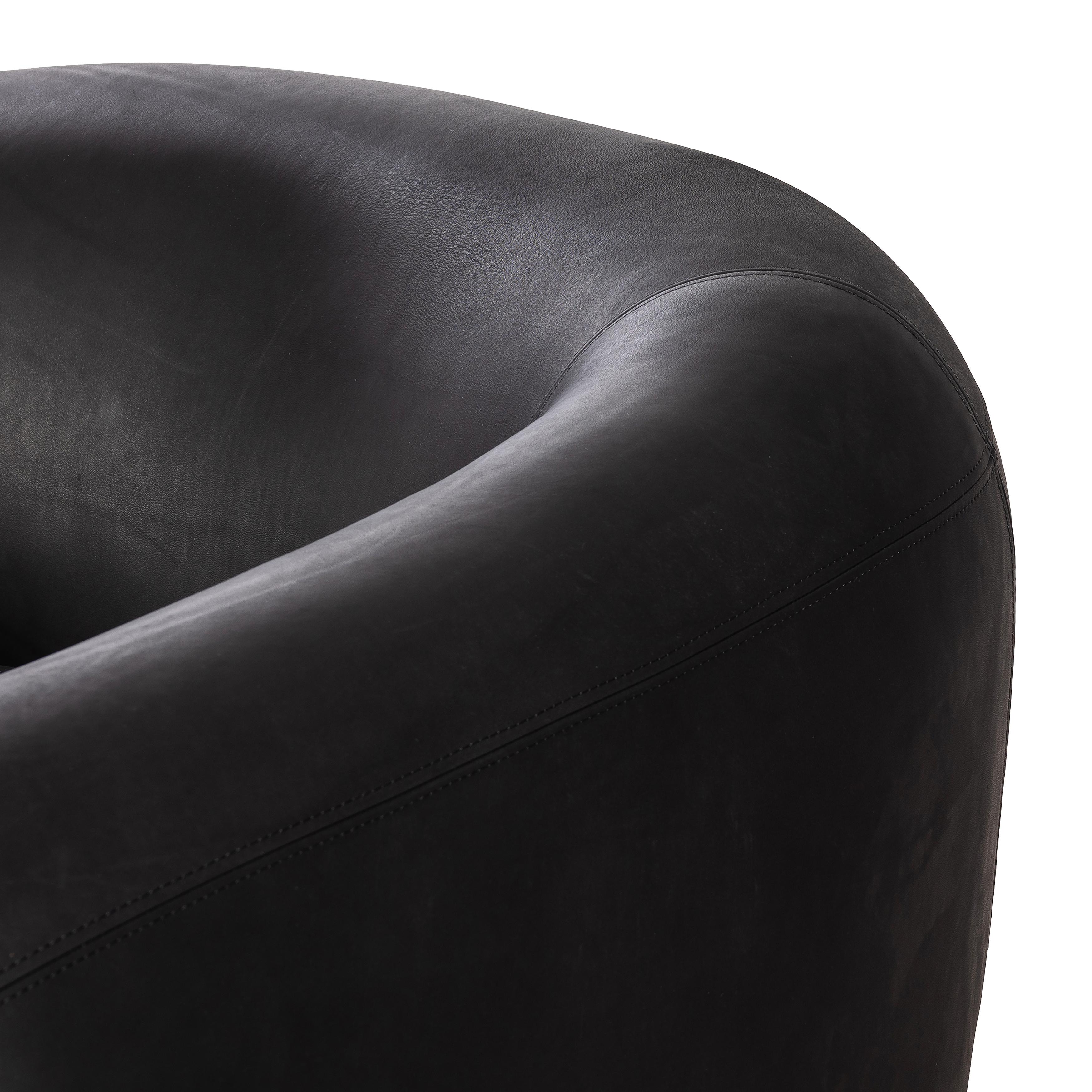 Featuring Lyla Chair - Heirloom Black by Four Hands at Amethyst Home. This updated take on the traditional tub chair pairs rich black top-grain leather with solid ash to shape a sculpted seat with exaggerated depth. Sourced from one of the oldest family-owned tanneries in Italyâ€™s Bassano del Grappa, heirloom leather is salvaged and processed from upcycled hides featuring an abunda. Amethyst Home provides interior design, new construction, custom furniture, and area rugs in the Dallas metro area.